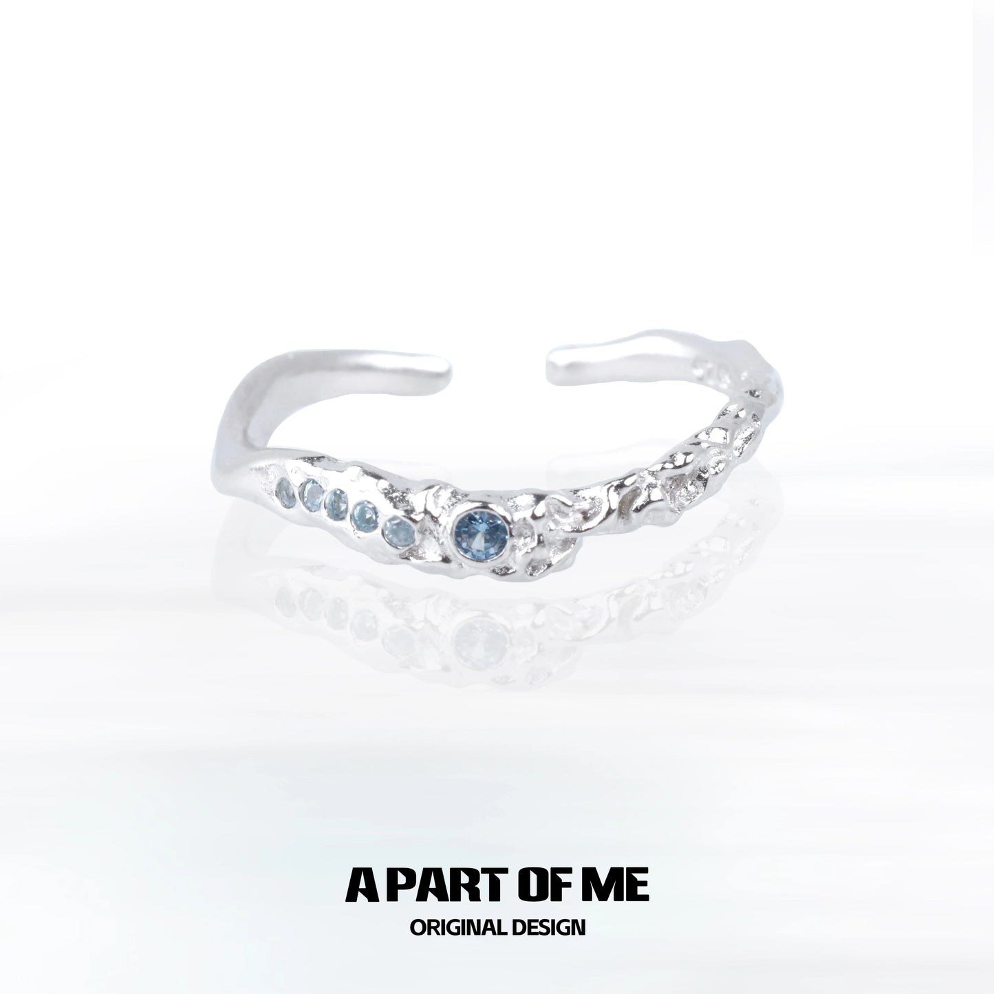 A unique silver ring featuring a mystic blue gemstone ring elegantly designed for everyday wear