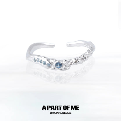 A unique silver ring featuring a mystic blue gemstone ring elegantly designed for everyday wear