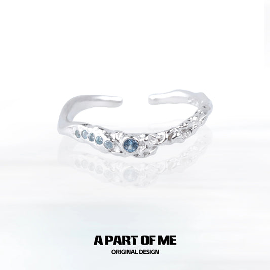 A unique silver ring featuring a mystic blue gemstone ring elegantly designed for everyday wear