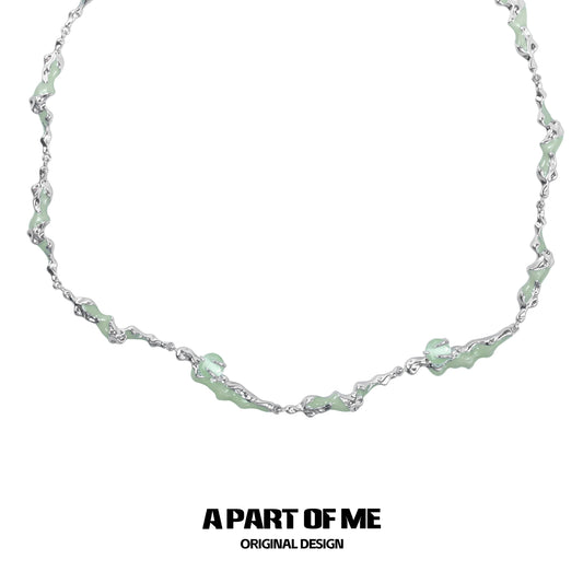 A PART OF ME opal anchor necklace featuring a unique wavy design with delicate detailing