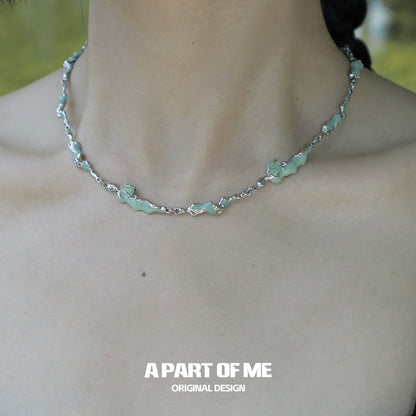 Opal anchor necklace designed by A PART OF ME with unique charm elements in a delicate silver chain