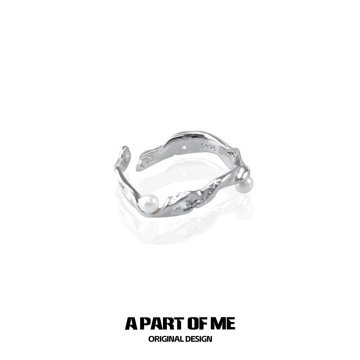 A Part of Me Pearl Statement Ring in Silver with a Unique Twisted Design
