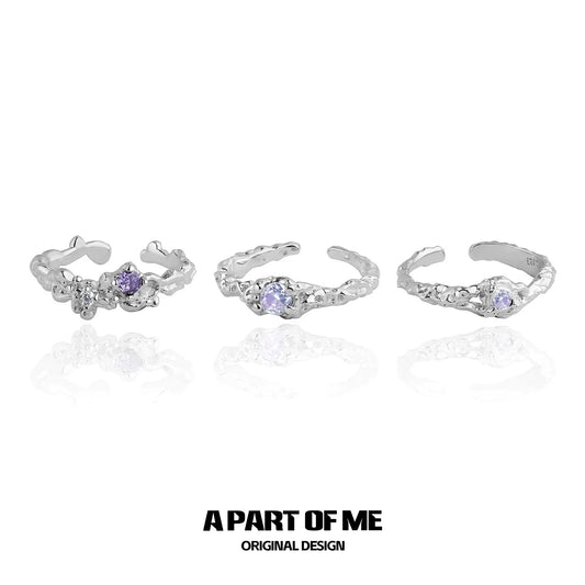A Part of Me purple zircon wave ring collection featuring three unique silver designs