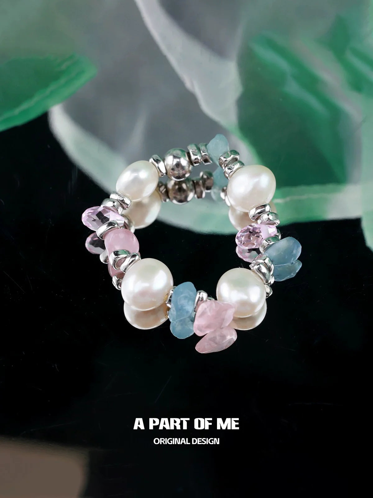 A PART OF ME rainbow pearl ring featuring multi-colored gems and elegant design for stylish accessories