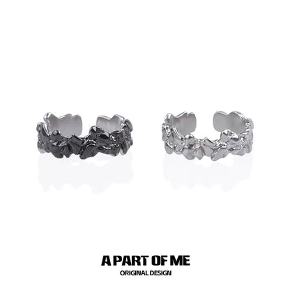 A PART OF ME rock band ring for men in silver and black finishes with unique textured design