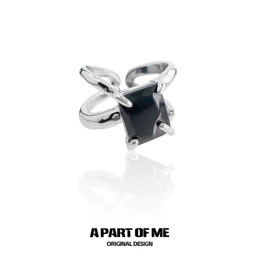 A PART OF ME savage claw hip-hop ring featuring a bold black stone and sleek silver claw design