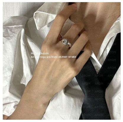 Stylish self-love ring for women shown on hand with a classic white shirt and black tie