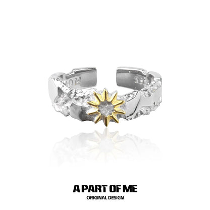 A PART OF ME sun and moon couple rings featuring a gold sun design with a textured band