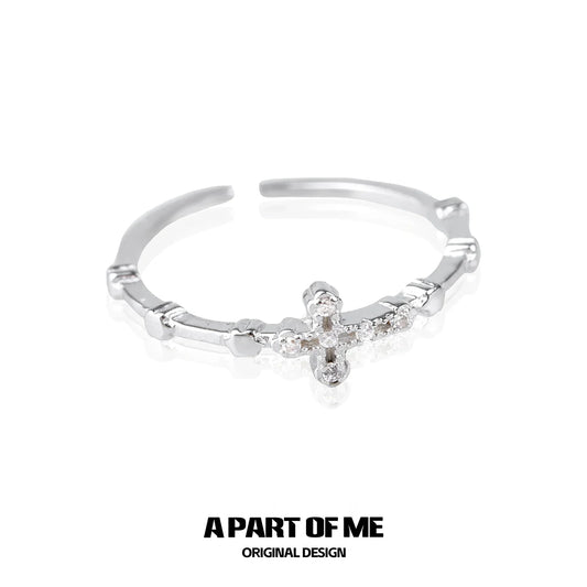 Textured cross silver ring featuring a delicate design with sparkling accents for a unique look