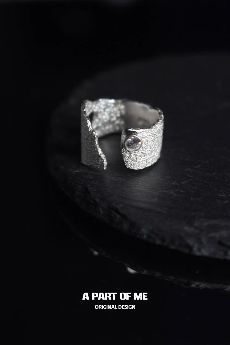 Textured silver travel ring with unique design and sparkling detail for everyday wear