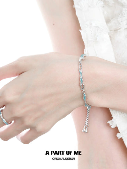 Elegant silver bracelet featuring wavy links designed by A PART OF ME with a touch of sophistication