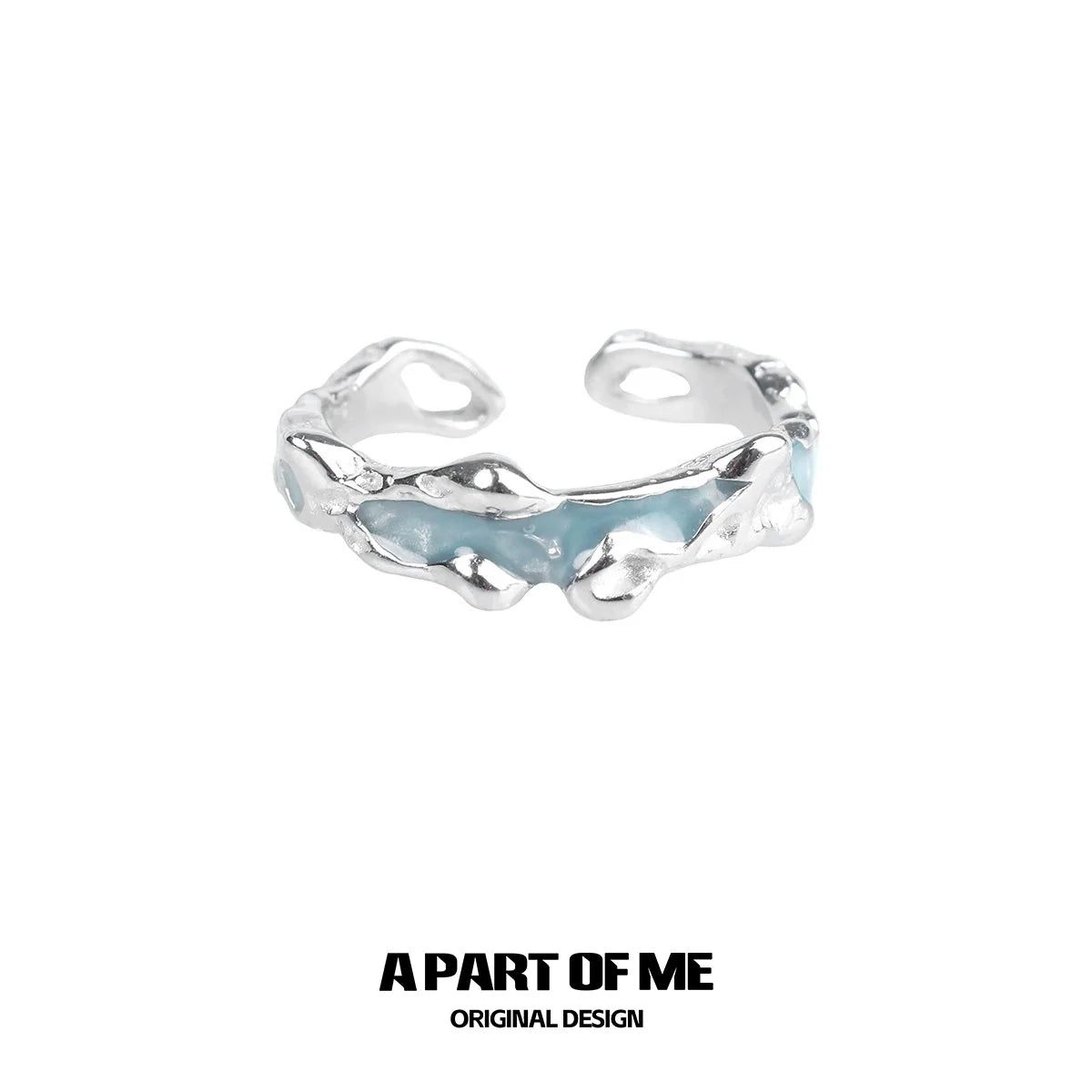 A PART OF ME white orchid love ring in silver with a unique twisted design and blue accents