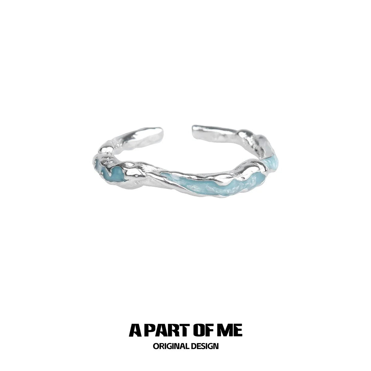 A PART OF ME White Orchid Love Ring with a unique twisted design and light blue accents