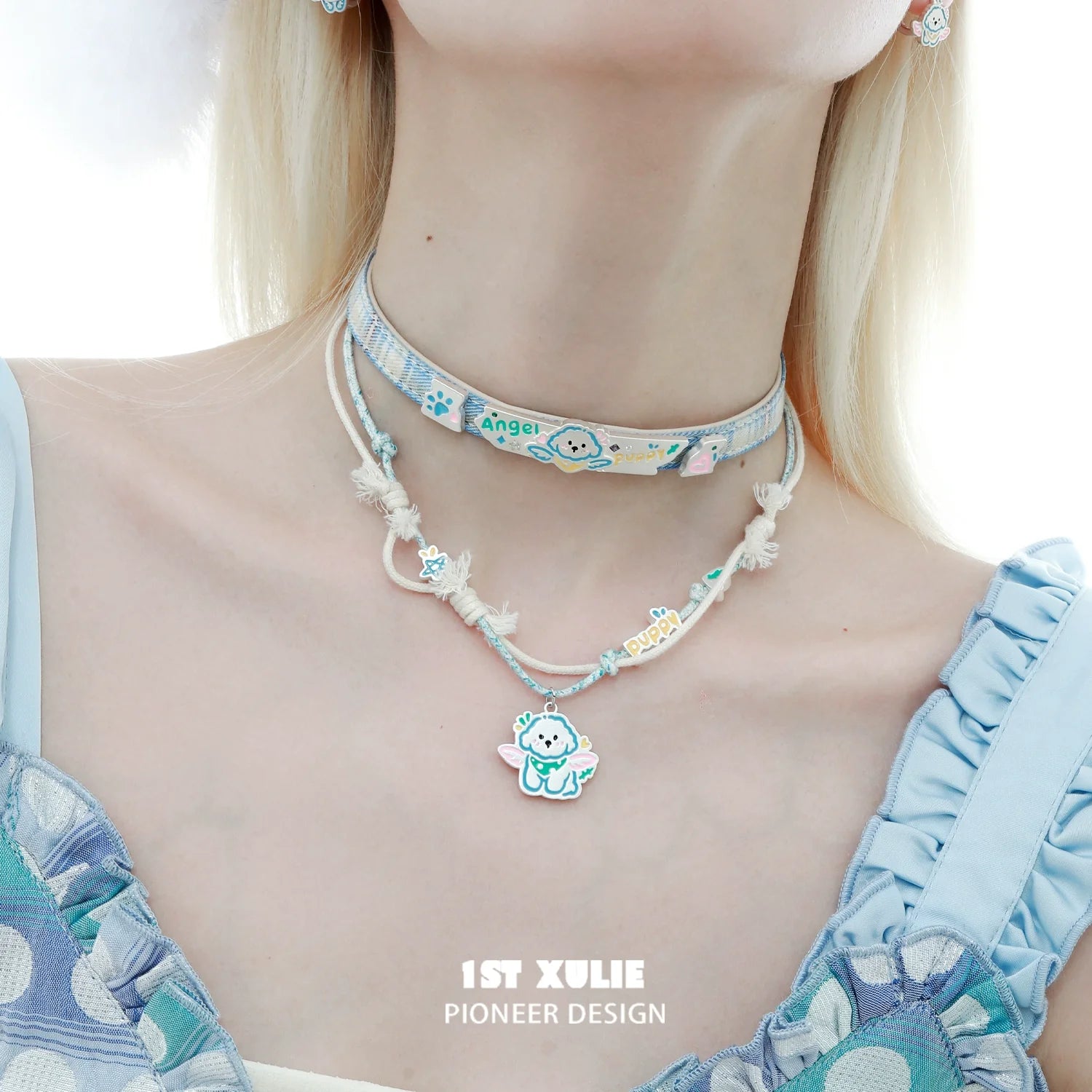 Cute angel cat and puppy necklace by 1STXULIE featuring colorful charms and playful design