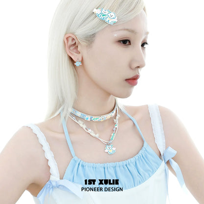 1STXULIE Angel Cat and Puppy Necklace Worn with Matching Accessories for a Cute Look
