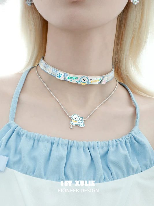 Cute angel cat puppy necklace featuring colorful charms and a delicate silver chain