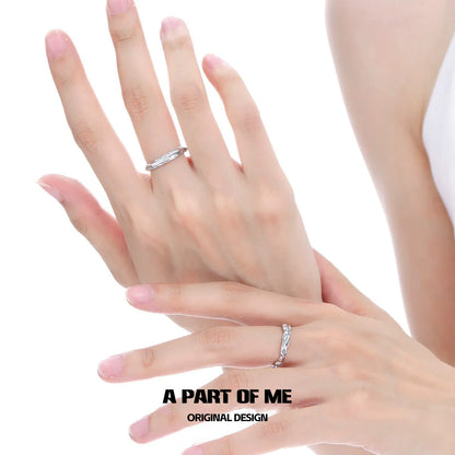 A Part of Me blue slim statement ring shown on elegant hands with delicate fingers showcasing its design.