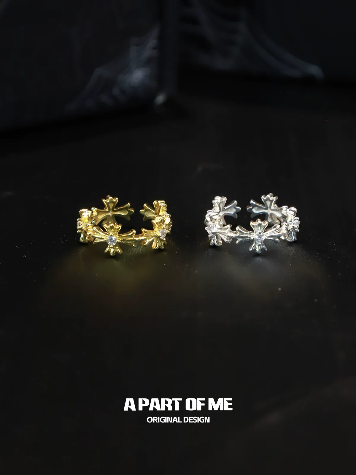 A PART OF ME cross couple rings in gold and silver featuring intricate designs with sparkling stones