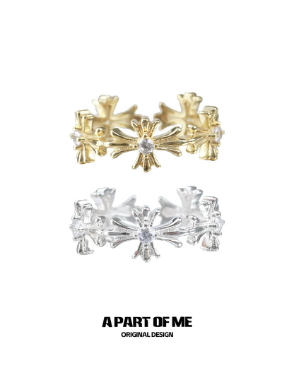 Elegant A PART OF ME cross couple rings in gold and silver, featuring intricate floral designs.