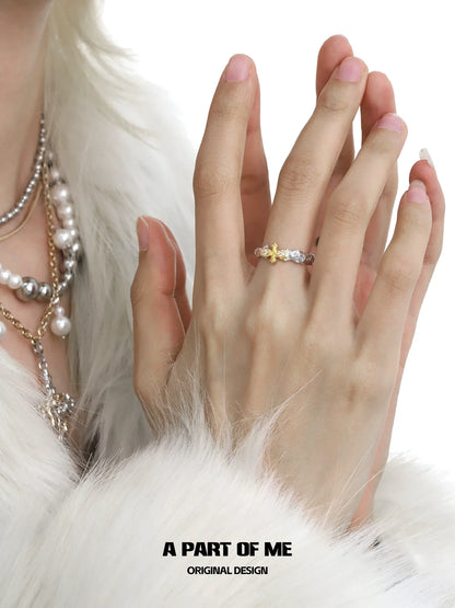 A PART OF ME cross couple rings featuring sparkling gemstones in a delicate design
