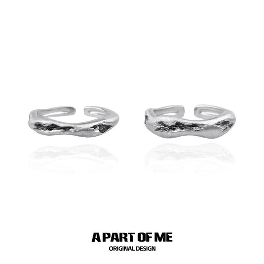 Stylish geometric couple rings in silver by A PART OF ME, featuring a unique textured design