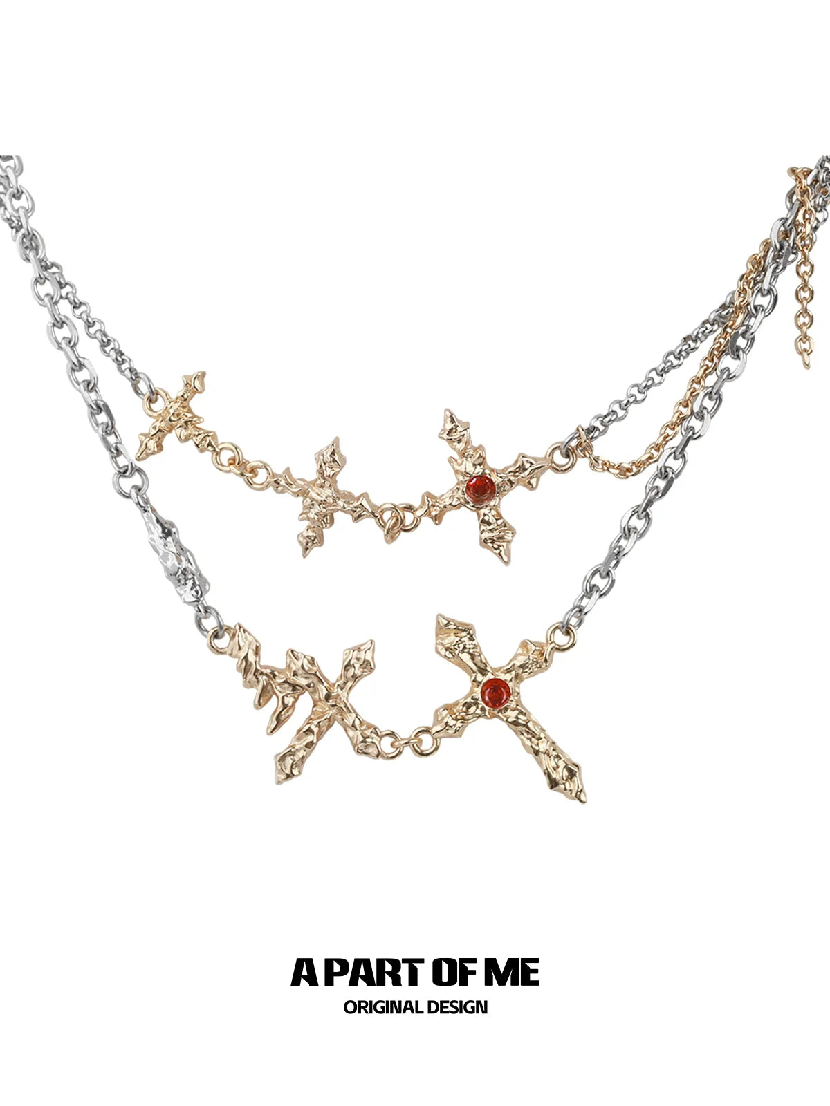A PART OF ME liquid metal cross necklace with golden crosses and red gemstone accents