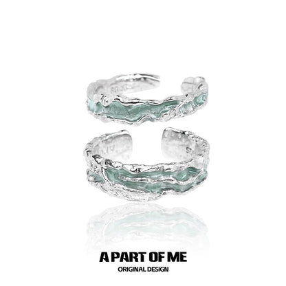 Unique mint silver ring with a textured design, perfect for stylish accessory lovers