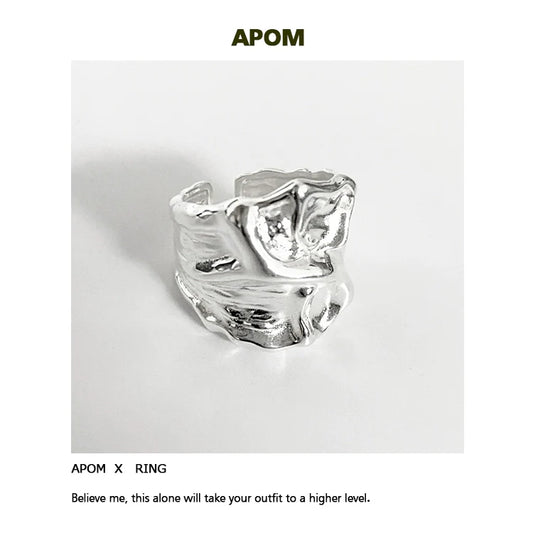 Lace pleated silver ring with a unique textured design for stylish accessory lovers