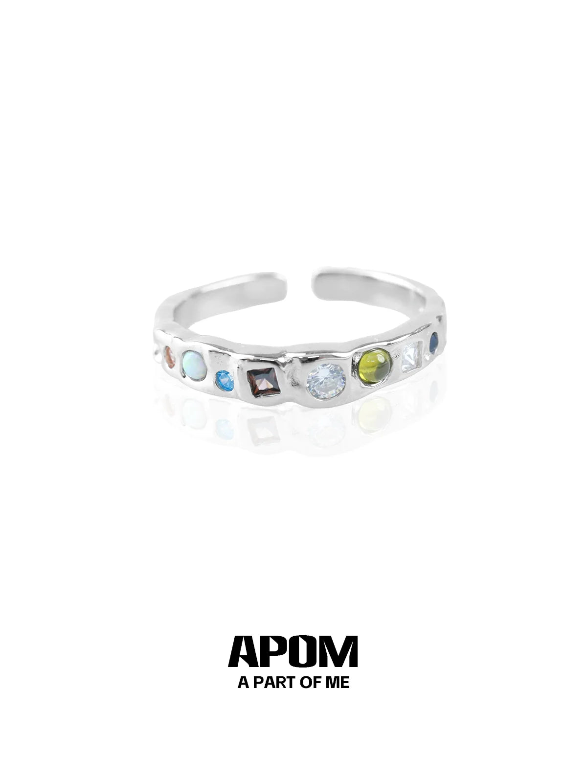 A PART OF ME rainbow gemstone ring featuring multiple colorful gemstones in a sleek silver band