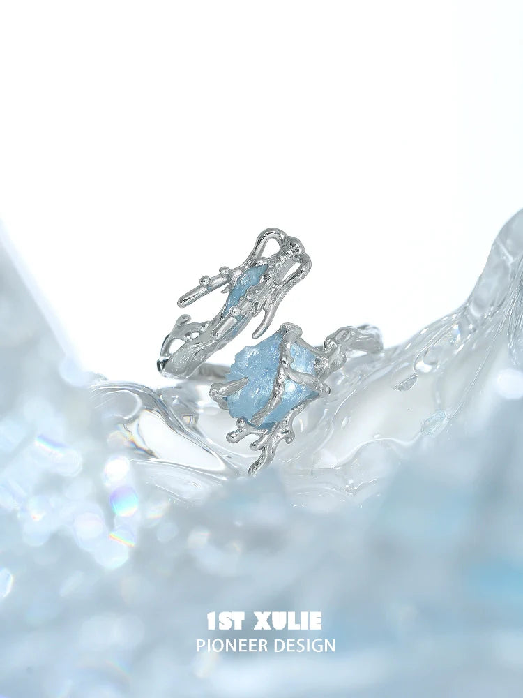 Stylish aquamarine dragon ring in silver design, showcasing intricate detailing and a unique gemstone