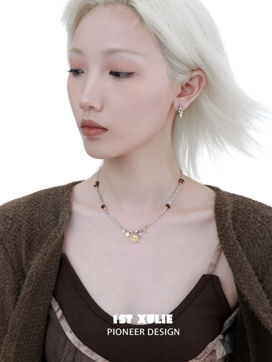 Autumn butterfly pendant necklace featuring delicate floral details, ideal for seasonal fashion.