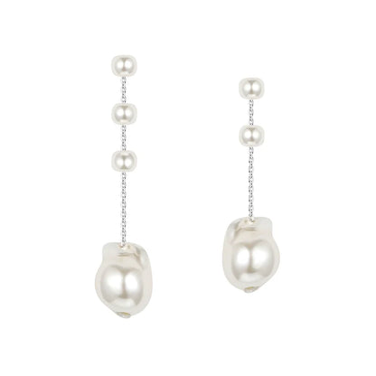 SUN HUNTER Baroque Pearl Earrings with Elegant Drop Design and Shimmering Accents