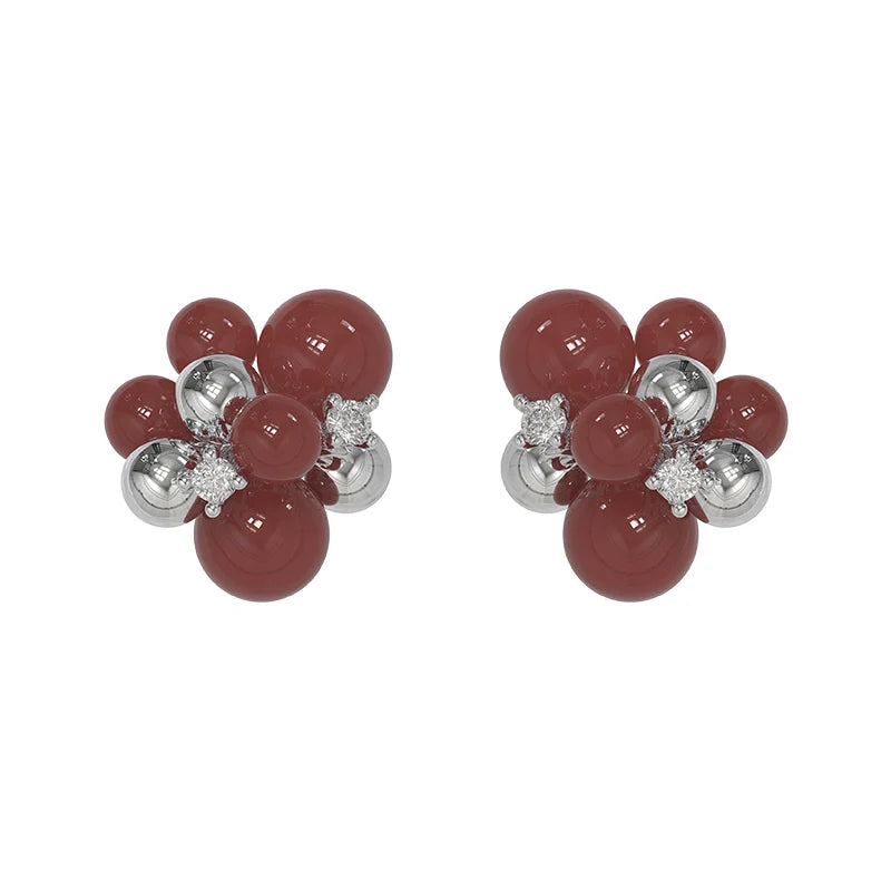 Elegant black agate earrings featuring a unique cluster design with sparkling accents