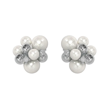 Elegant black agate earrings with a unique design featuring lustrous pearls and silver accents