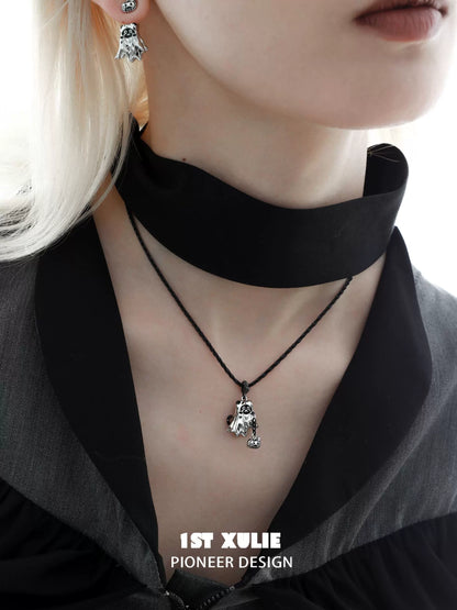 Charming black cat ghost necklace featuring a spooky design for a unique accessory look