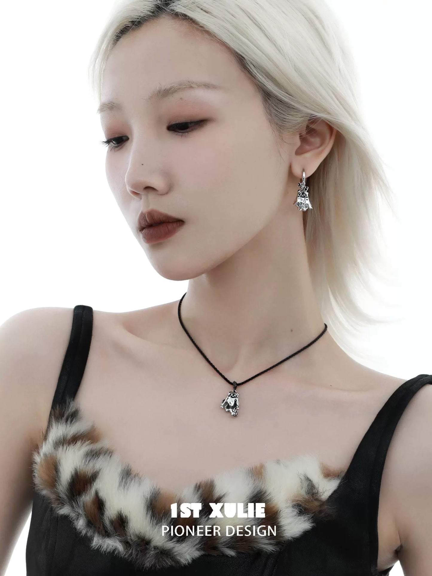 Stylish black cat ghost necklace from 1STXULIE paired with elegant earrings for a chic look