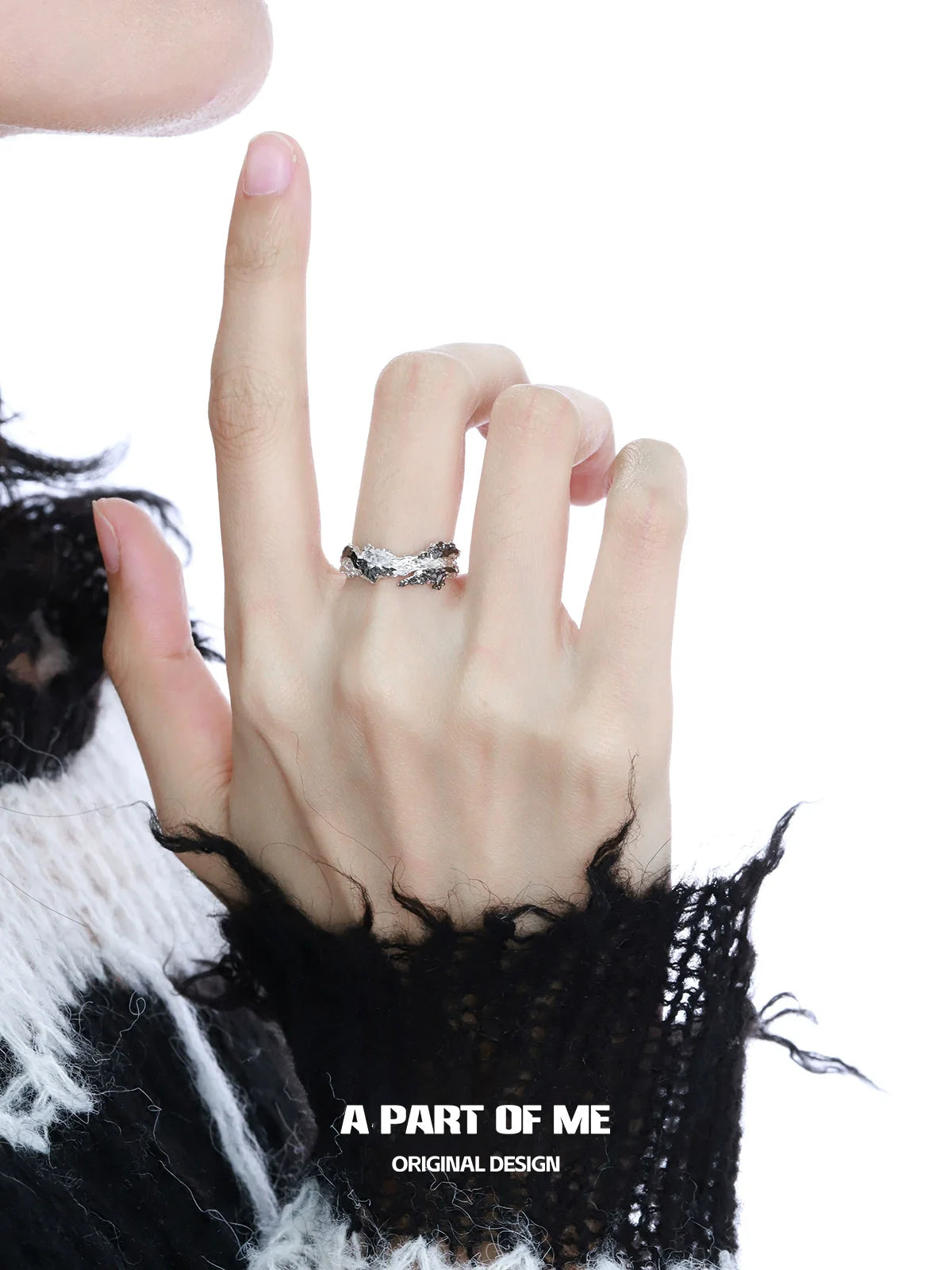 A PART OF ME Black Contrast Ring on a model's hand with stylish design in focus