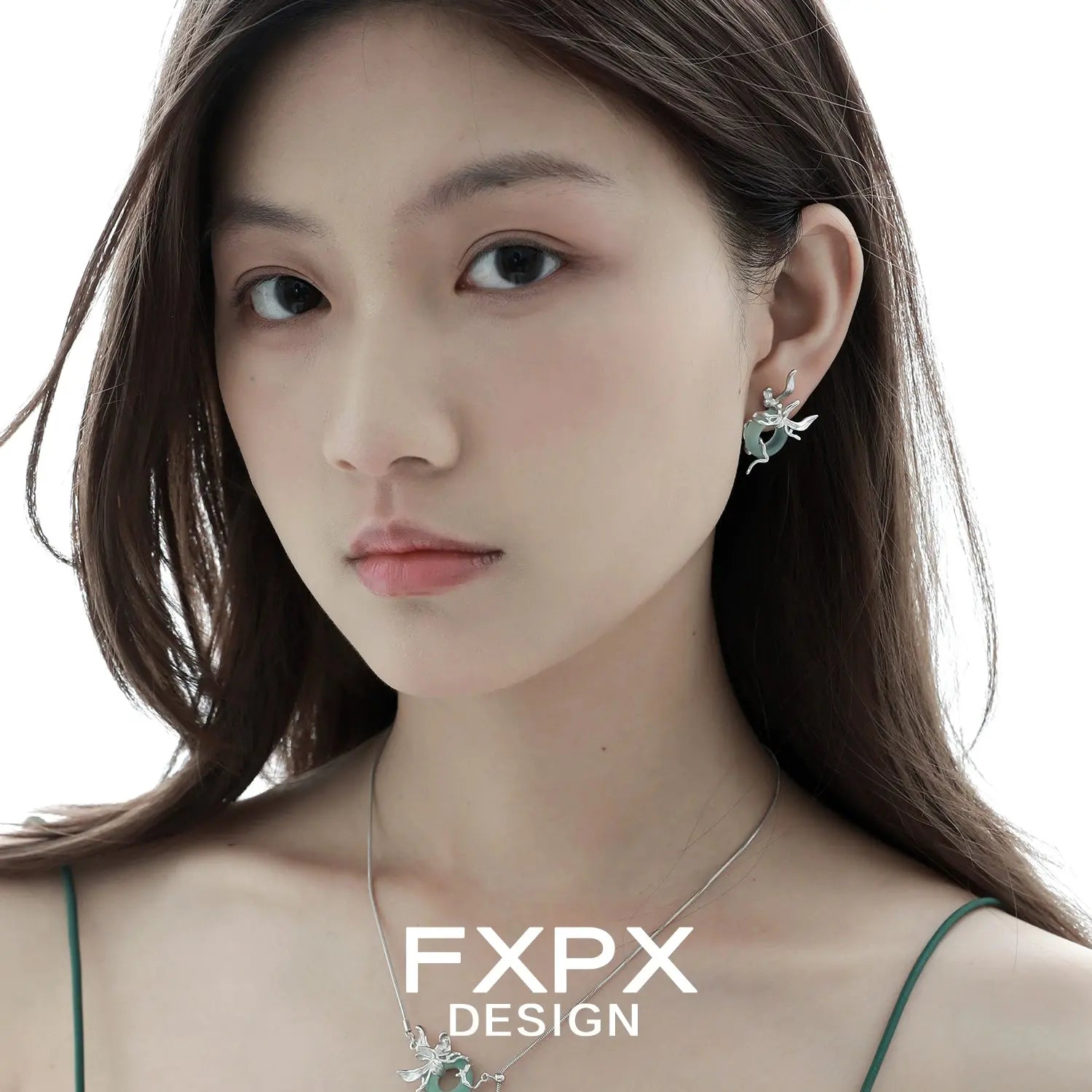 Model wearing unique jade earrings for women with floral design by FXPX