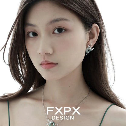 Model wearing unique jade earrings for women with floral design by FXPX