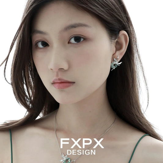 Model wearing unique jade earrings for women with floral design by FXPX