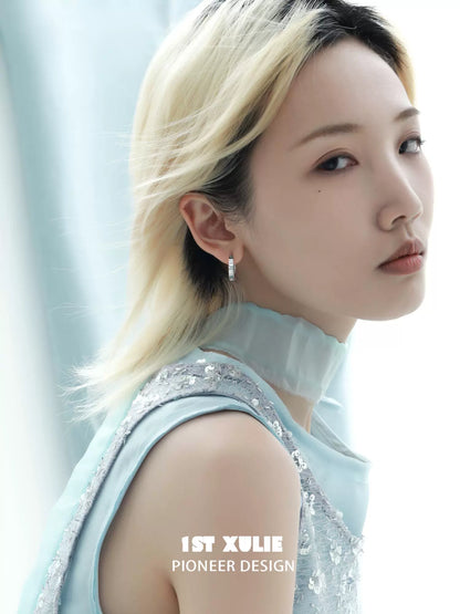 Elegant 1ST XULIE blue butterfly earrings showcasing delicate design and vibrant color