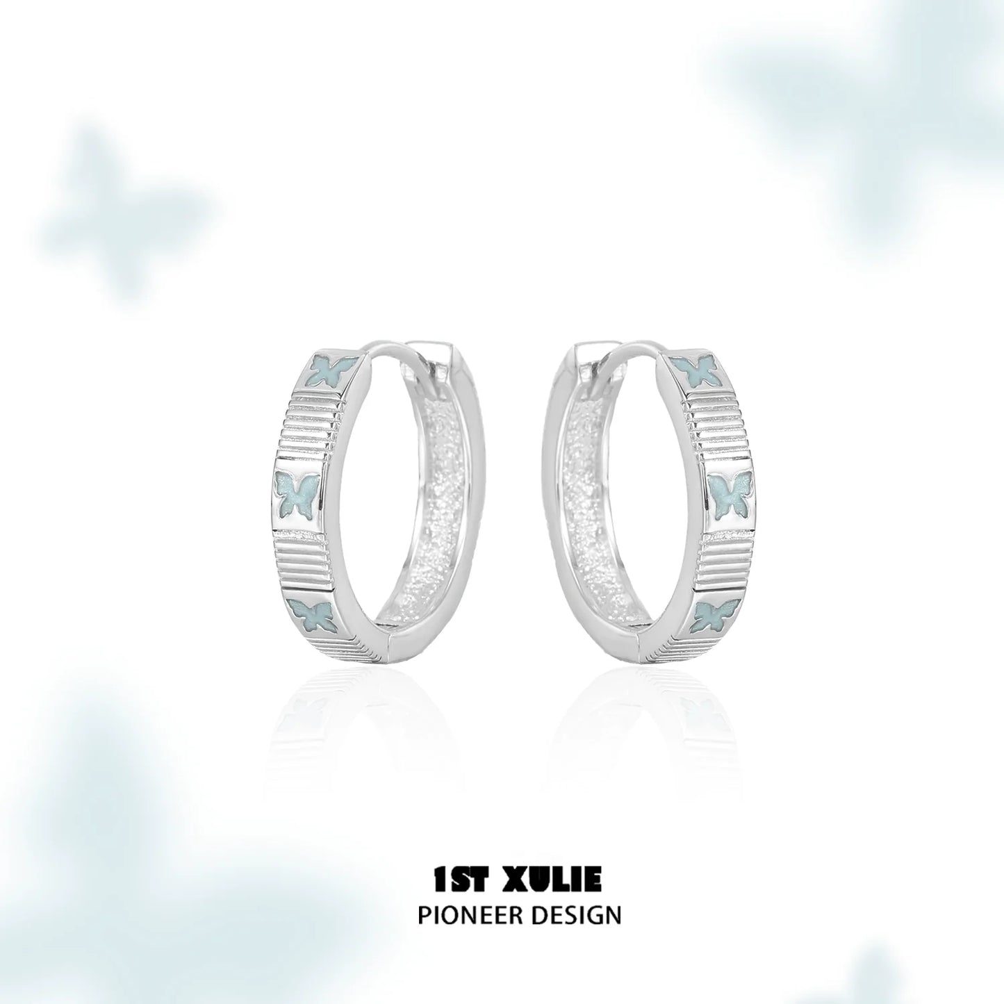 Elegant silver hoop earrings featuring blue butterfly earrings for a stylish look