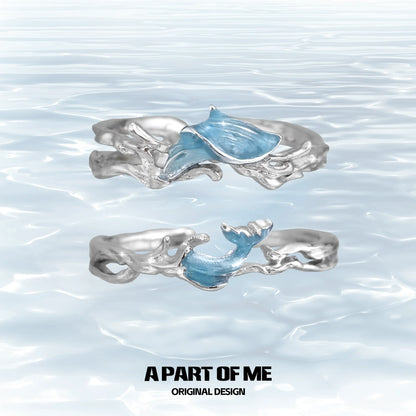 Beautiful blue fishtail couple rings featuring a unique wave design from A PART OF ME