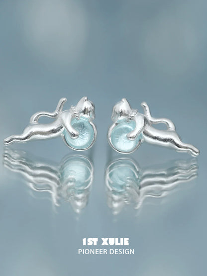 Unique silver blue kitten earrings for women featuring playful cat design and light blue accents