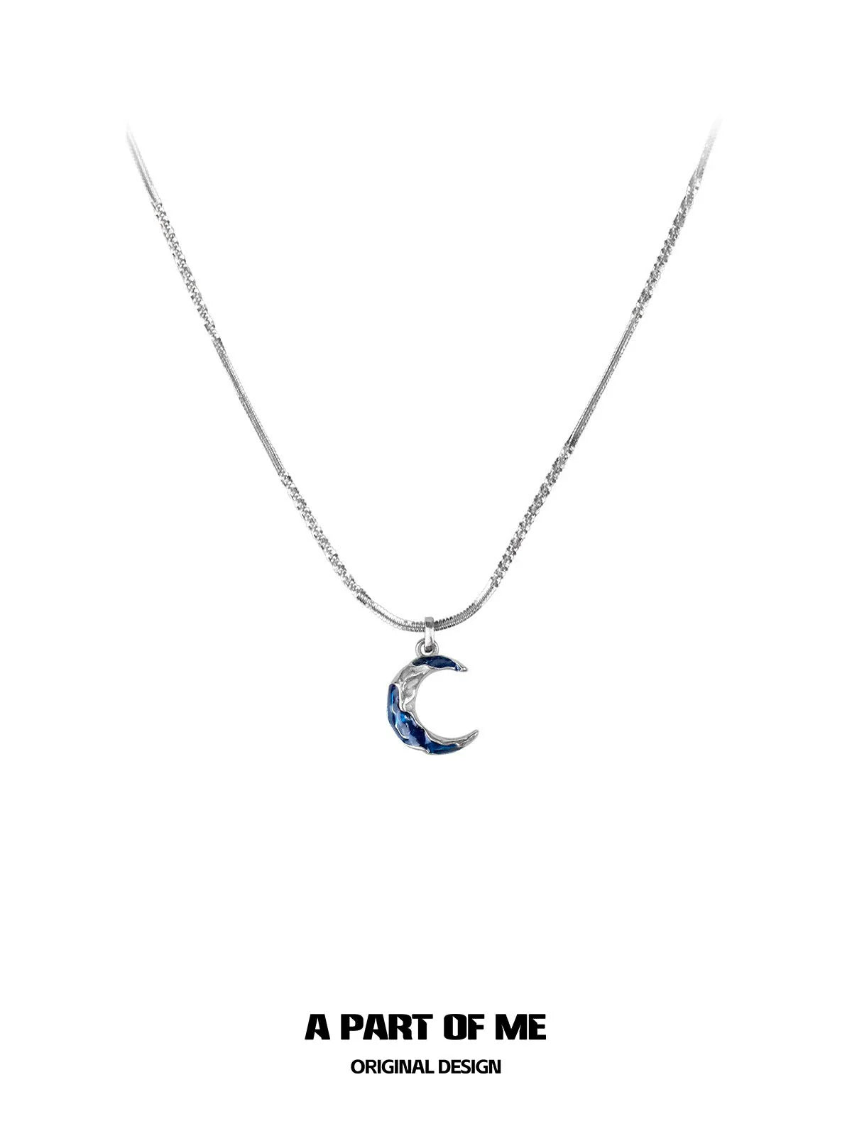 A PART OF ME blue moon pendant necklace featuring a delicate chain and crescent moon charm