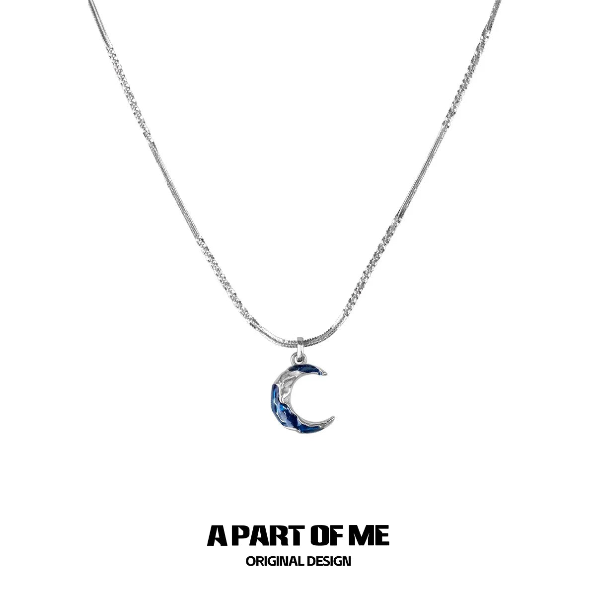 A PART OF ME blue moon pendant necklace with shimmering design on a delicate silver chain