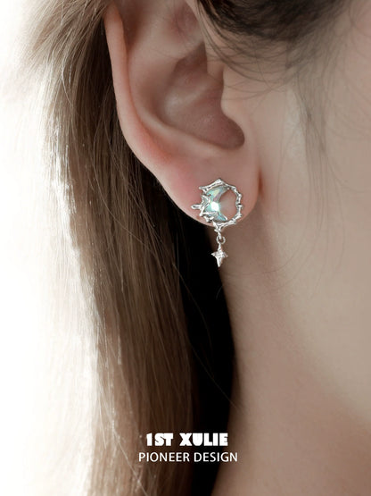 1ST XULIE Blue Moon Silver Earrings featuring a unique design with a dangling charm