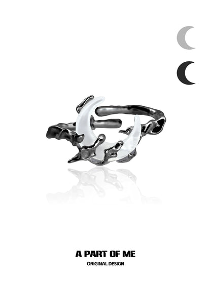 A PART OF ME bone orchid moon ring with a unique twisted design and contrasting colors