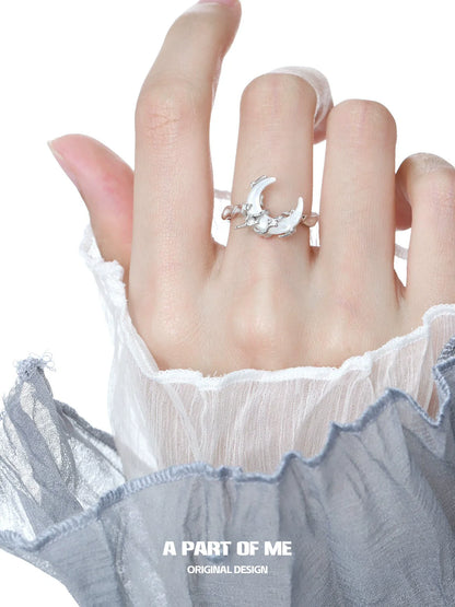 Bone orchid moon ring by A PART OF ME featuring a delicate crescent design on a hand