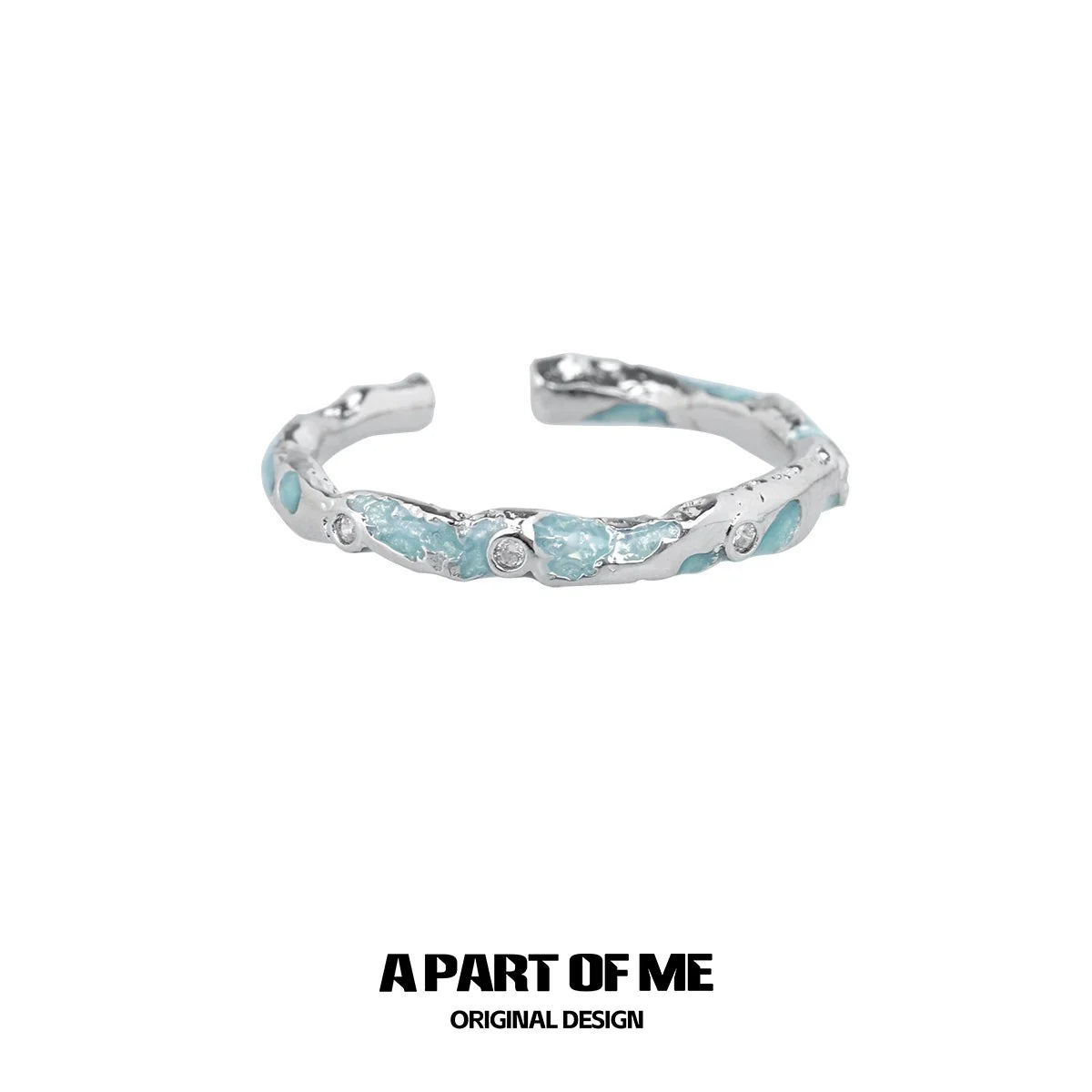 A PART OF ME broken starry sky ring with a textured silver design and blue accents